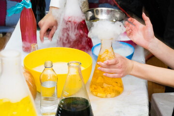 Experiments with chemistry for children during the halloween celebration