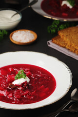 A plate with Ukrainian national dish - borsch