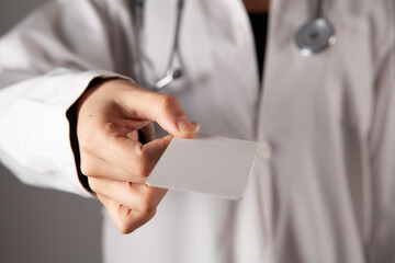 plastic card in doctor hand