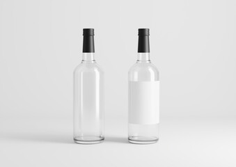 Blank transparent wine bottle with glasses on the empty background
