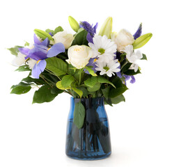 Funeral Bouquet purple White flowers, Sympathy and Condolence Concept on white background with copy...