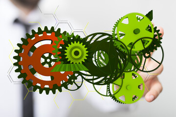 Mechanism, green metallic gears and cogs at work on brown background. Industrial machinery. 3D