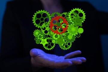 Set of green gears and cogs on black background