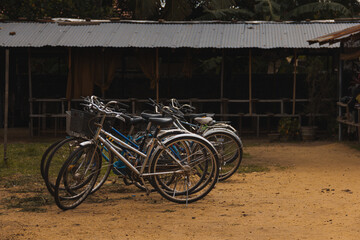 Fototapeta na wymiar Bikes lined up in school in Sri Lanka