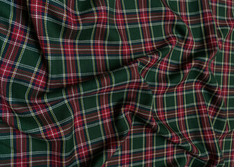 Green tartan woolen school uniform fabric material. Scottish classic seamless flannel cloth....