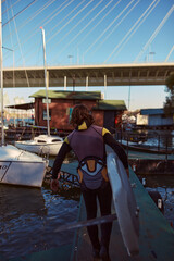 Windsurfer surfing on a windy day at the river.