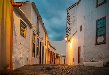 street with old houses in the evening - la palma - canary island