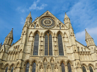 South facade with great stained glass mosaic rose window of York Minster cathedral, England, UK