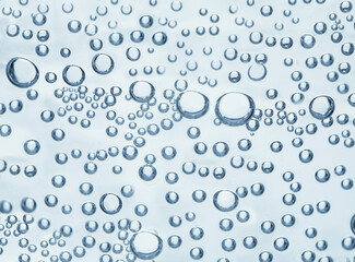 Soda water with bubbles as background, closeup view