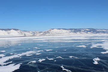 Baikal lake in winter, ice formations, cliff, snow landscape
