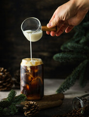 coffee with fir branches and cones
