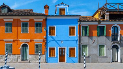 Fototapeta na wymiar Burano island. Paint building house in travel Europe Venezia city. Venice Italy color street. Famous travel destination. Summer landscape.