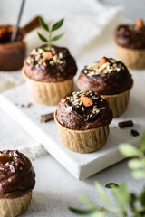 chocolate muffins with nuts and chocolate