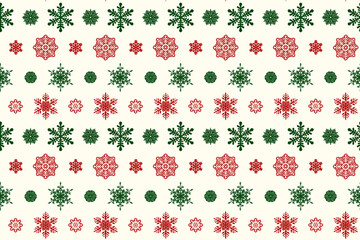 オフホワイト地に赤と緑の雪の結晶模様
