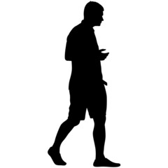 Silhouette of a walking man on a white background