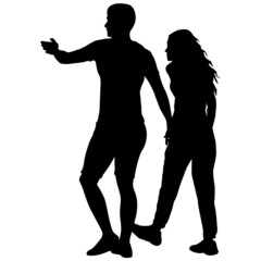 Silhouette man and woman walking hand in hand
