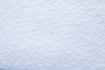 Natural snow texture. Smooth surface of clean fresh snow. Snowy ground. Perfect for Christmas and New Year design.