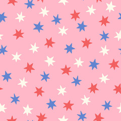 Blue, red and white stars on pink seamless pattern