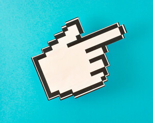 the computer mouse cursor in the form of a hand and a finger from the lower left corner points to the upper right corner. blue background.