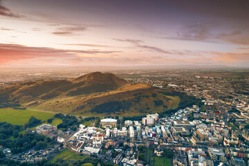 Aerial view of Holyrood Park is the largest of Edinburgh's royal parks. Edinburgh's Holyrood Park popular tourist destinations in the city. People enjoy the beautiful lakes, ponds, natural woodlands