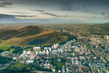 Fototapeta na wymiar Aerial view of Holyrood Park is the largest of Edinburgh's royal parks. Edinburgh's Holyrood Park popular tourist destinations in the city. People enjoy the beautiful lakes, ponds, natural woodlands