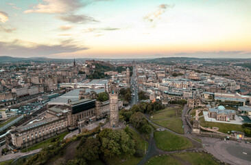 Aerial sunrise view of Nelson Monument in Calton Hill, Edinburgh, Scotland. Large monument to a famous military leader. When it was built, the Nelson Monument was the tallest structure in the world