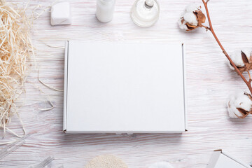 White cardboard, carton boxes on wooden table, for cosmetic small business