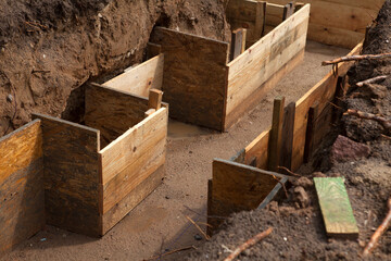 Clapboards for concrete foundation of a house