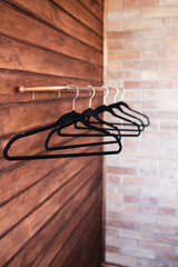 clothes hanger on a wood wall