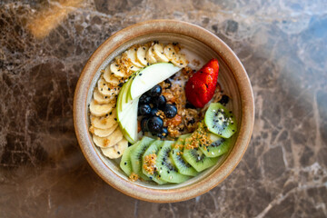 delicious colorful fruit smoothie bowl in fine dining breakfast restaurant