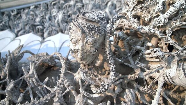 Wat Rong Khun is a white Buddhist temple located near the city of Chiang Rai in Thailand