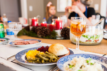 A meal set up at the table setting eat food cup candles celebrate gather together family one 
