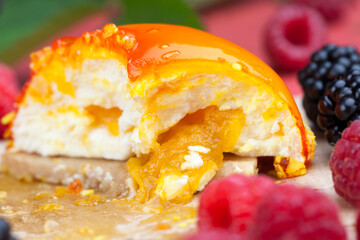 one orange cake with creamy white filling