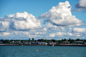 Two Kayakers Paddling on Bellingham Bay on a Windy Day in June - obrazy, fototapety, plakaty