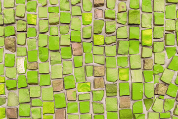 Texture of old green ceramic mosaic	