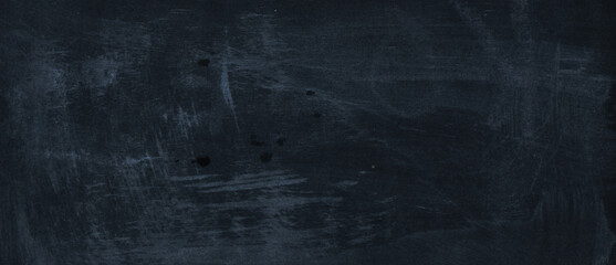 Empty school chalk board on a wooden table. Empty space to enter text or insert graphics. Concept in education or business.