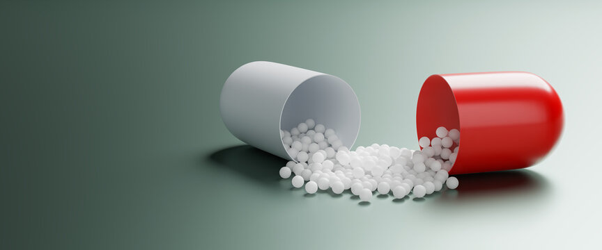 An open pill capsule spilling the active ingredient