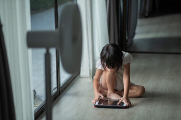 chinese child addicted phone, asian girl playing smartphone, kid watching cartoon