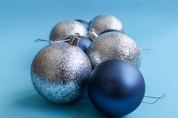 blue christmas balls on blue background