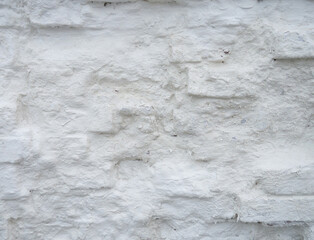 Old, uneven masonry.   whitewashed brick, brickwork