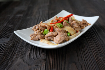 Stir Fried Pork with Shrimp Paste and bitter beans.