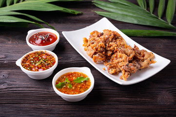 Crispy fried sliced belly pork with spicy sauce