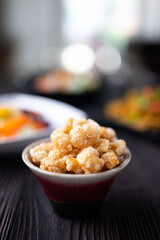 Homemade deep fried crispy pork rind in bowl.