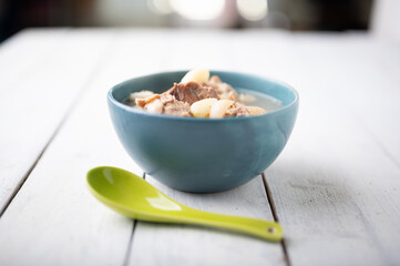 Boiled pork leg clear soup with peanut