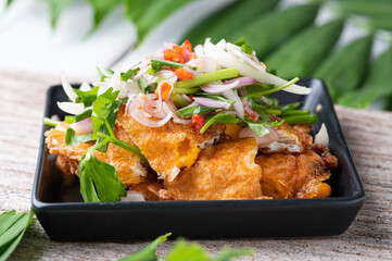 Spicy salad with fried eggs, Thai Spicy Food, Thai Cuisine