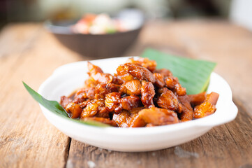 Sweet Pork Condiment (Thai name is muu waan) Thai streaky pork menu with coconut or palm sugar and black sauce