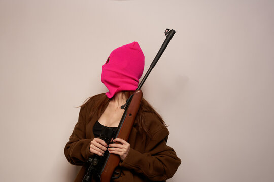 female shooter danger crime fashion isolated background