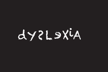 dyslexia spelled in white chalk letters on a blackboard
