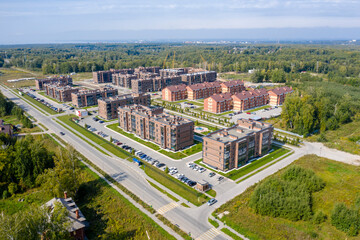 Aerial view of a condominium under construction in the forest in Siberia