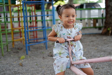 little child playing on playground